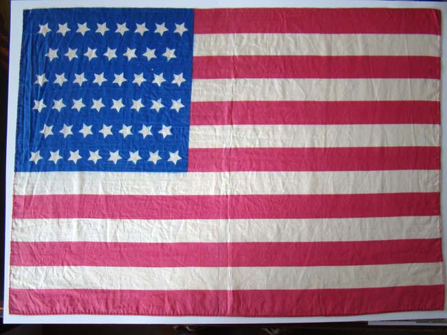 A 46 star American flag made of silk dating to 1907-1912